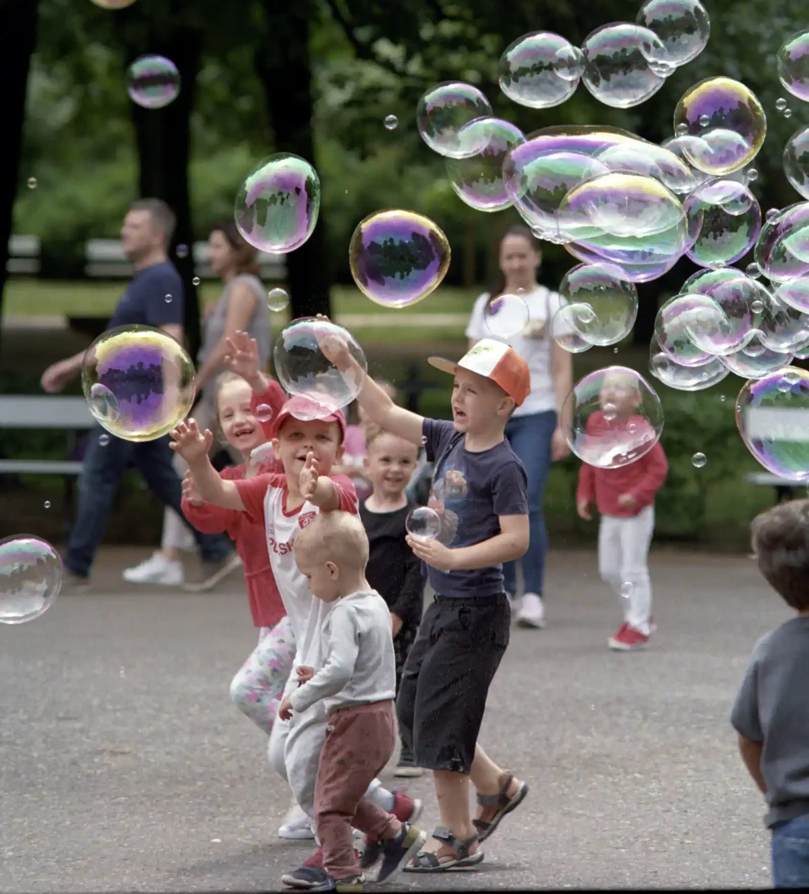 kids playing with bubbles